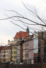 Fototapeta premium Old town of Bratislava, Slovakia on sunny spring day. Beautiful buildings, blossoming trees, street view. Architecture of central Europe. 