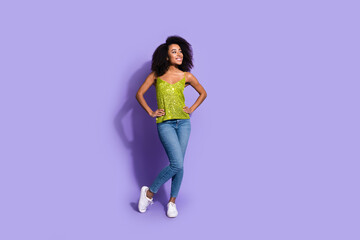 Fototapeta na wymiar Full length photo of gorgeous young girl girlish look empty space wear trendy green sequins outfit isolated on purple color background