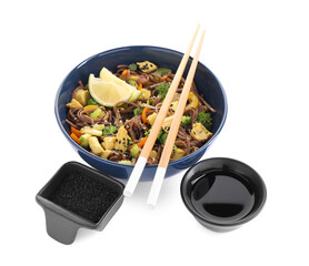 Stir-fry. Delicious cooked noodles with chicken in bowl, soy sauce and sesame on white background