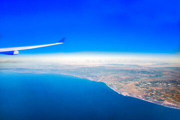 Aircraft wing over California United States pacific ocean Blue Sky
