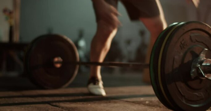 Sportsman doing pushups during workout at fitness club