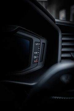 Car fuel gauge close-up. Car dashboard. Car interior