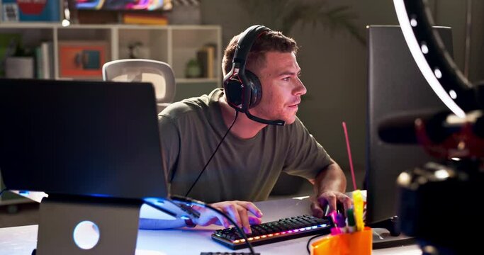 Gaming, angry and man with pc for live streaming on social media, mobile app and website. Influencer, content creator and frustrated person with ring light for tutorial, broadcast and video games