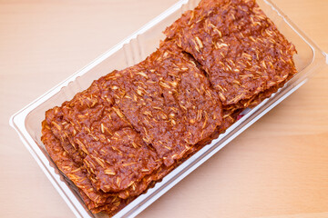 Close up sliced sheets of dried sweet pork - 786445239