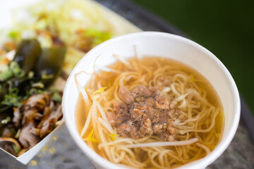 Minced pork noodles in take away bowl