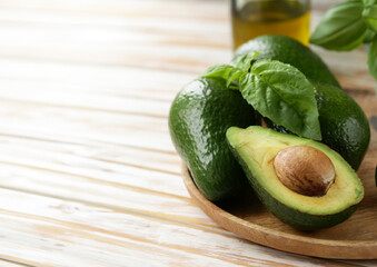 natural organic avocado with fresh basil - 786453458