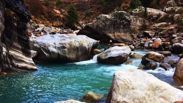 Timelapse of Turquoise blue glacial water of Parvati River in Himalayas, India