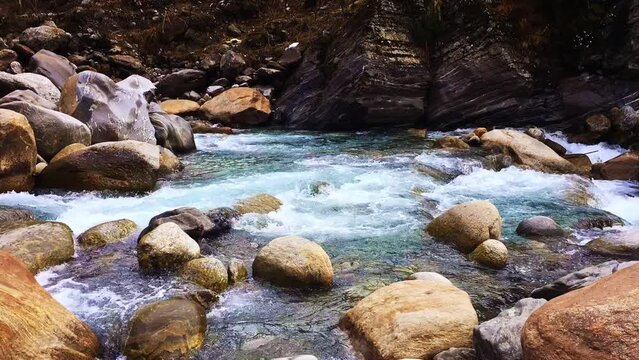 Timelapse of  blue glacial water of Parvati River in Himalayas, India