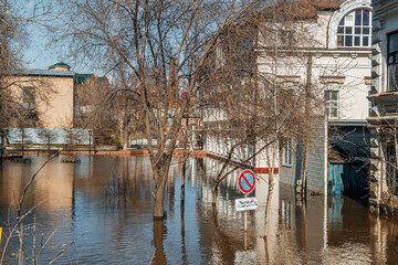 Orenburg, Russia - 04.16.2024: flooded houses in Orenburg after the spring flood on the Ural river - Powered by Adobe