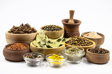Assortment of spices close-up isolated on white background.