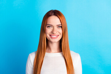 Photo portrait of attractive young woman smile look camera dressed stylish white clothes isolated on blue color background