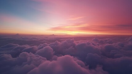 Natural background, Romantic sunset sky. Beautiful sunset sky above clouds with dramatic light. Cabin view from airplane