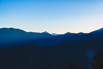 Breathtaking sunrise vista from Alishan Mountain, Taiwan. The Alishan National Scenic Area is a mountain retreat and nature reserve situated in Alishan Township, Chiayi County, Taiwan.