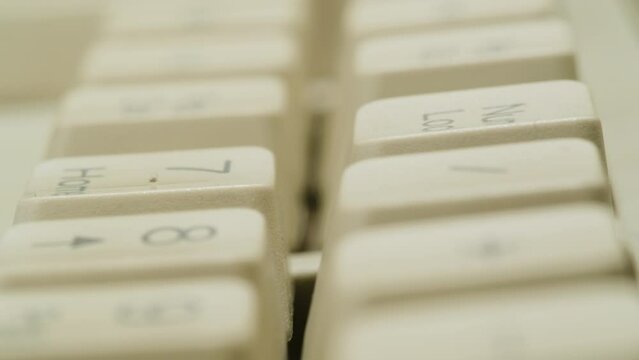 Old vintage keyboard retro pc close-up , Old computer studio close-up, Desktop vintage retro wave display, late 90s PC.