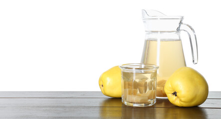 Delicious quince drink and fresh fruits on wooden table against white background