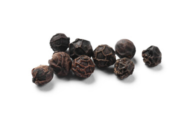 Aromatic spice. Many black dry peppercorns isolated on white