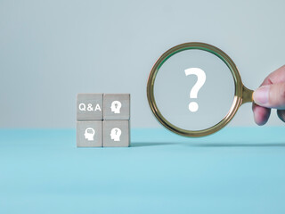 Question and answer concept. Q and A symbols on wooden blocks. Social networks. Introduction...