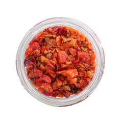 Aromatic spice. Red chili pepper flakes in jar isolated on white, top view