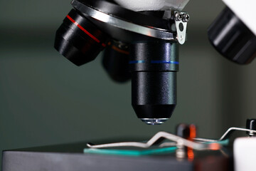 One microscope on dark background, closeup view