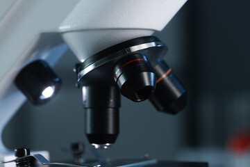 One microscope on blurred background, closeup view