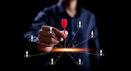 Targeting the business concept, Businessman hand holding red dart to the virtual target dartboard,...