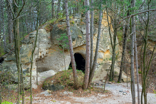 artificial caves in the dolomite rock at the Harz mountain above Bath Voeslau, resulting through the former extraction of grinding sand, Austria