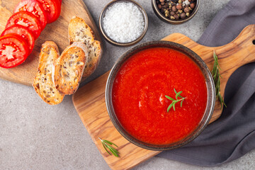 Tomato soup or sauce with rosemary.  Healthy, vegan and dieting lunch and dinner concept. Gazpacho. 