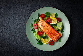 grilled salmon fillet, with vegetables, broccoli, cherry, iceberg lettuce, spices and herbs, homemade, no people,