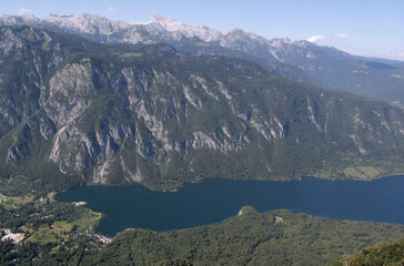 Fototapeta na wymiar Landscape photo with mountains and Bohinjsko Lake in Triglav National Park, Slovenia