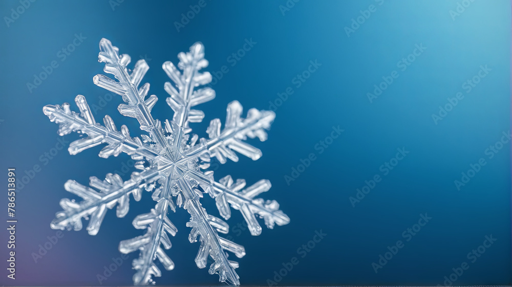 Poster close-up view of a intricate snowflake resting on a vibrant blue background, showcasing its delicate
