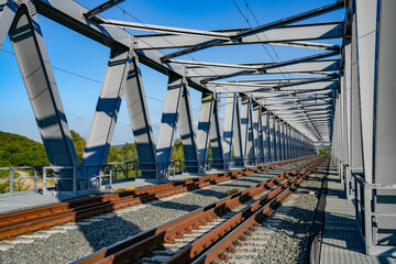 Metal structure of a railway bridge over Mures river in Arad county, Romania, Europe - 786515680