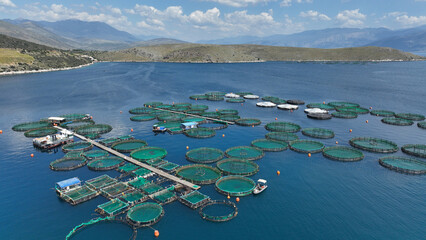 Aerial drone photo of latest technology self feeding fish farming unit of sea bream and sea bass in...