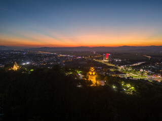 Aerial view of Nhan temple, tower is an artistic architectural work of Champa people in Tuy Hoa city, Phu Yen province, Vietnam. Sunset view.