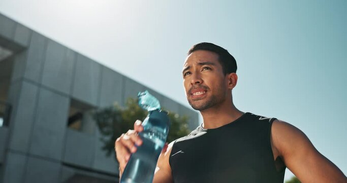 Asian man, city and drinking water for fitness or workout, refreshment and wellness with exercise routine. Male person or athlete, bottle and h2o for hydration or health, tired and thirsty on break.