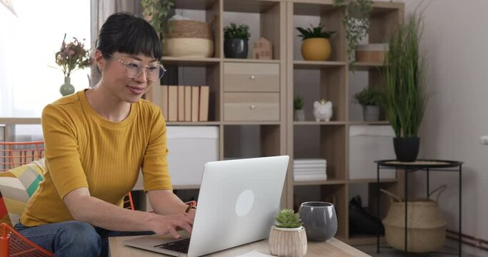 Japanese woman work at home with laptop online