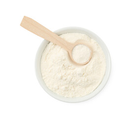 Fototapeta na wymiar Baking powder in bowl and spoon isolated on white, top view