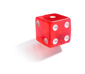 One red game dice isolated on white