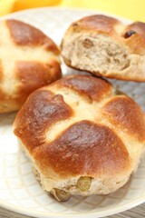 Hot cross buns on table, closeup. Easter celebration