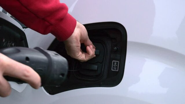 Charge cable plugin in EV, electric van.