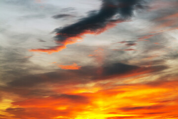 Background of a beautiful bright orange sunset with cirrus clouds - 786536473
