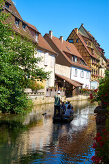 Old town of Colmar with the river Lauch in Alsace in France