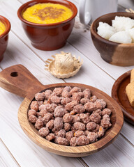 Typical brazilian june festival food over white wooden table. Festa junina