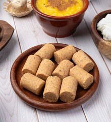 Typical brazilian june festival food over white wooden table. Festa junina