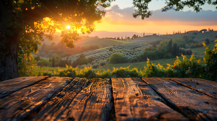 Empty Wooden Table on the Background of Vines,
A rustic wooden tabletop with a panoramic view of rolling green hills and a warm sunrise