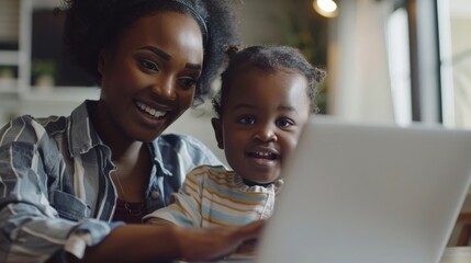 parent and child using laptop - obrazy, fototapety, plakaty