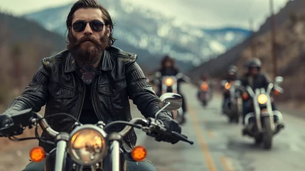 Foto op Plexiglas A man with a beard and sunglasses is riding a motorcycle with other people on the road. Scene is adventurous and exciting. a group of chopper motorcyclists. Riders dressed in black leather jackets. © Nataliia_Trushchenko