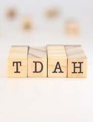 abbreviation for attention deficit hyperactivity disorder in Spanish TDAH letters isolated on white background.