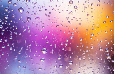 Rainbow-hued background with transparent glass and raindrops, evoking a sense of whimsy and enchantment as vibrant colors blend with the gentle patter of rain
