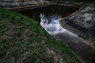 Small pond in forest at spring season background