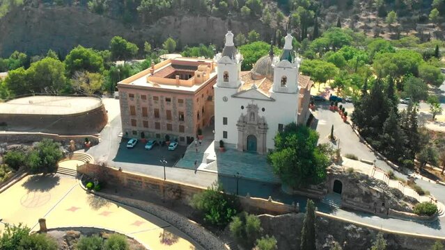 Aerial drone view of the Catholic Church Sanctuary of Virgen de la Fuensanta in Murcia, surrounded by mountains in south Spain. Rotating shoot.